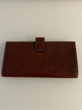 Tusk brown leather slim wallet with red interior. Brand new, without tags.